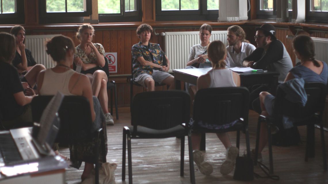 Philip leads a Chaplin Bible Study for the Orchestra.